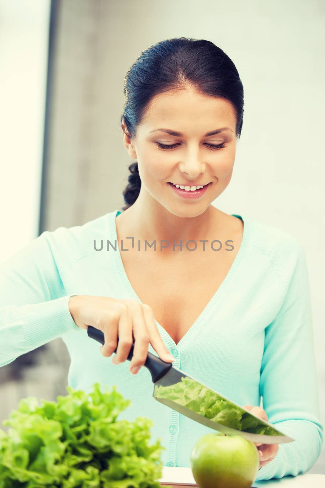 picture of beautiful woman in the kitchen.