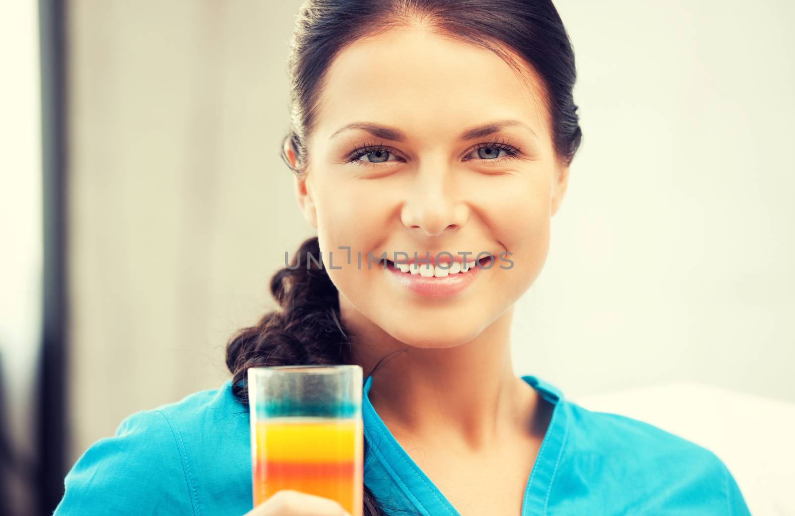 picture of beautiful woman with glass of juice