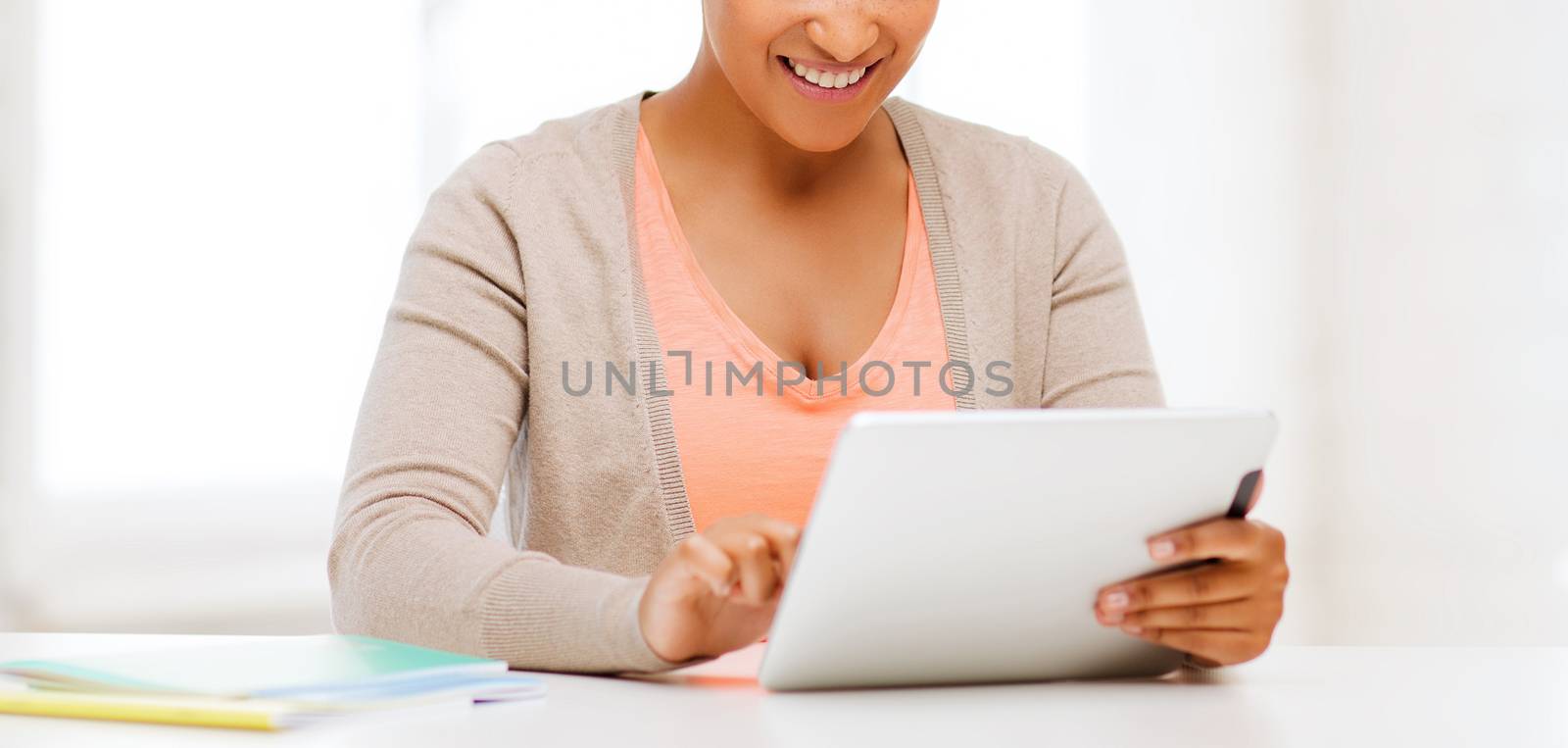 business and education concept - smiling student girl with tablet pc