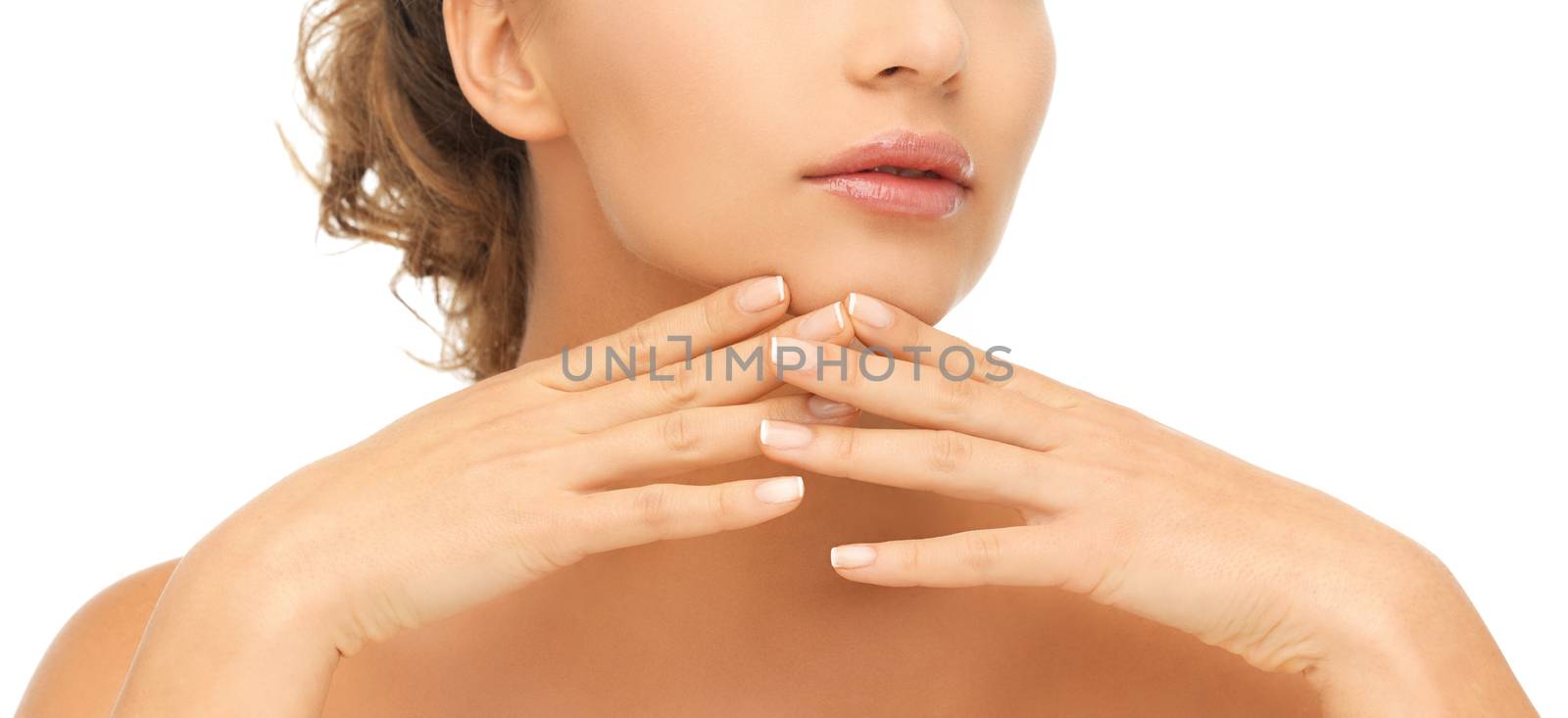 health and beauty concept - face and hands of beautiful woman with updo (can be used as a template for jewelry)