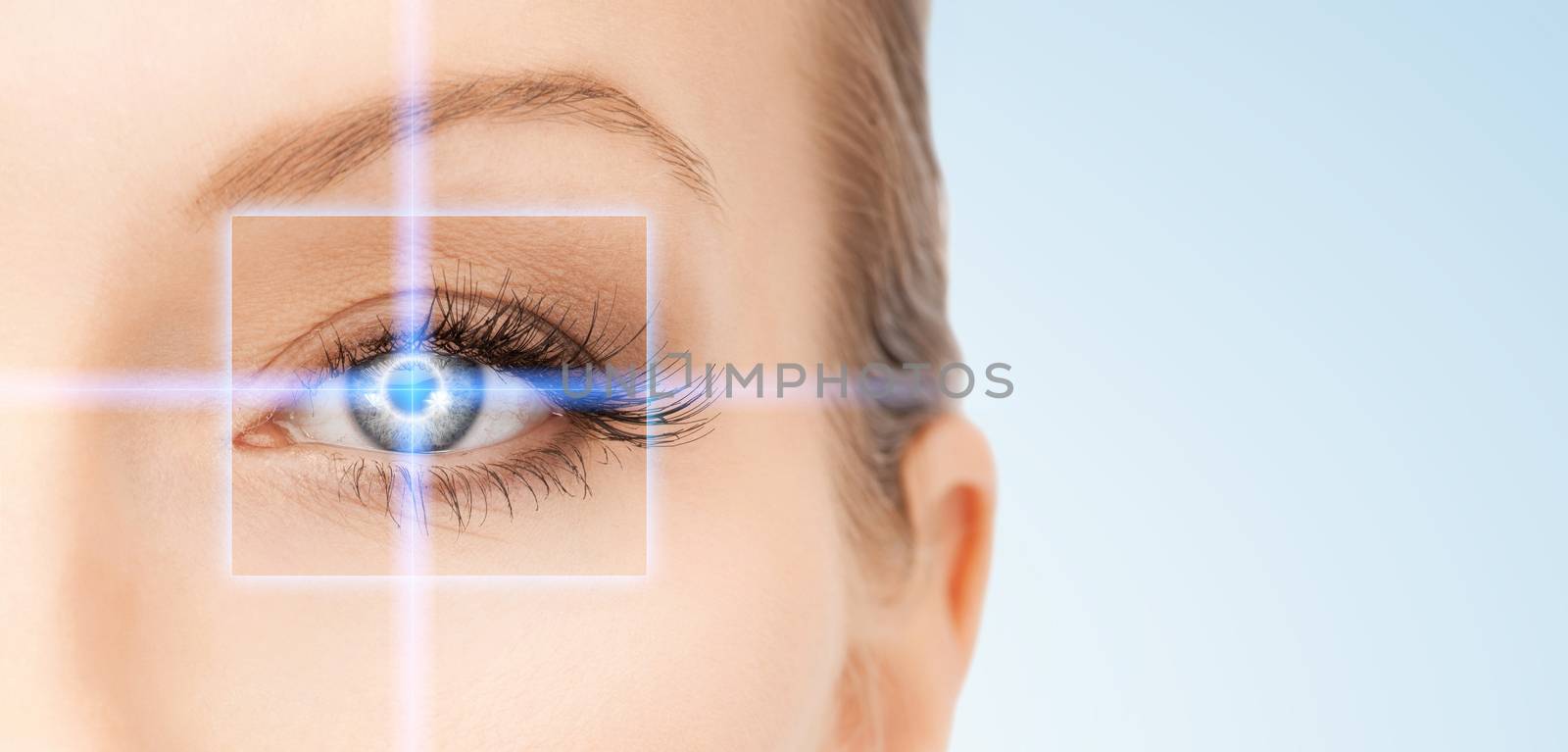 picture of beautiful woman pointing to eye