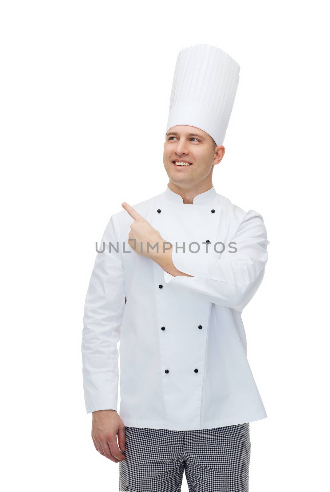 cooking, profession, advertisement and people concept - happy male chef cook pointing finger up to something