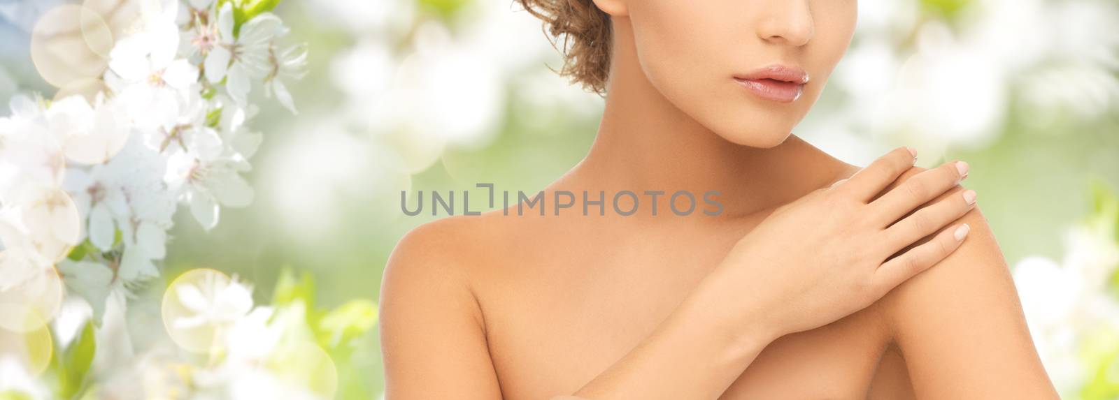 close up of young woman with bare shoulders by dolgachov