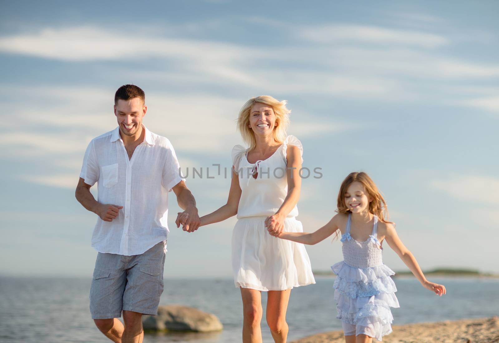 happy family at the seaside by dolgachov
