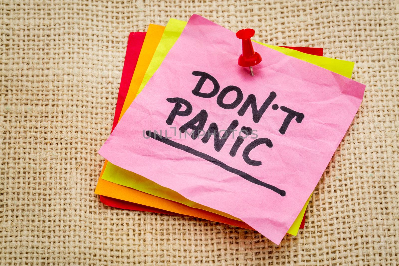 Do not panic on a sticky note against burlap canvas - dealing with stress concept