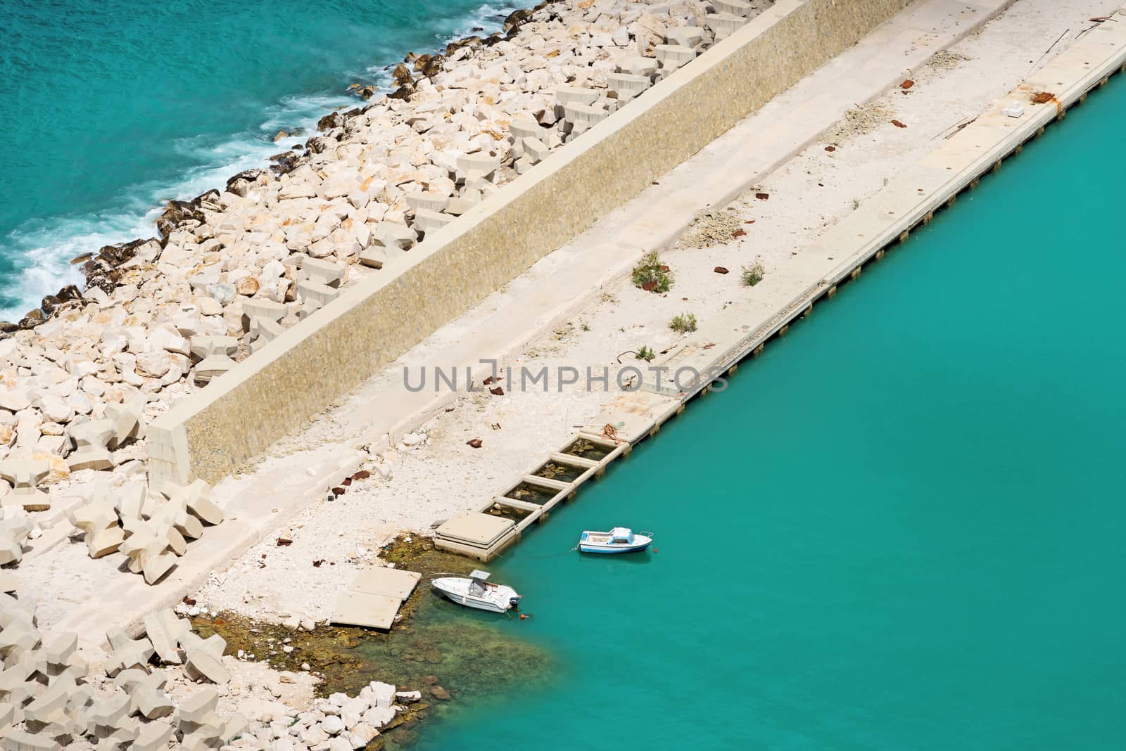 Two lone boats at pier