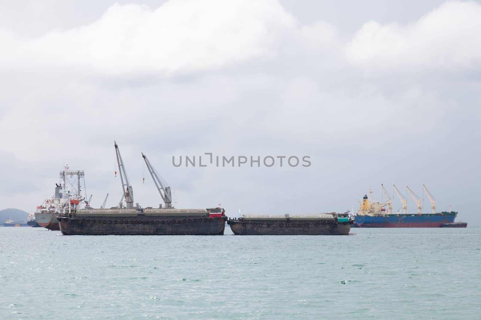 Cargo ship. Parking in the sea to await transportation to the port.