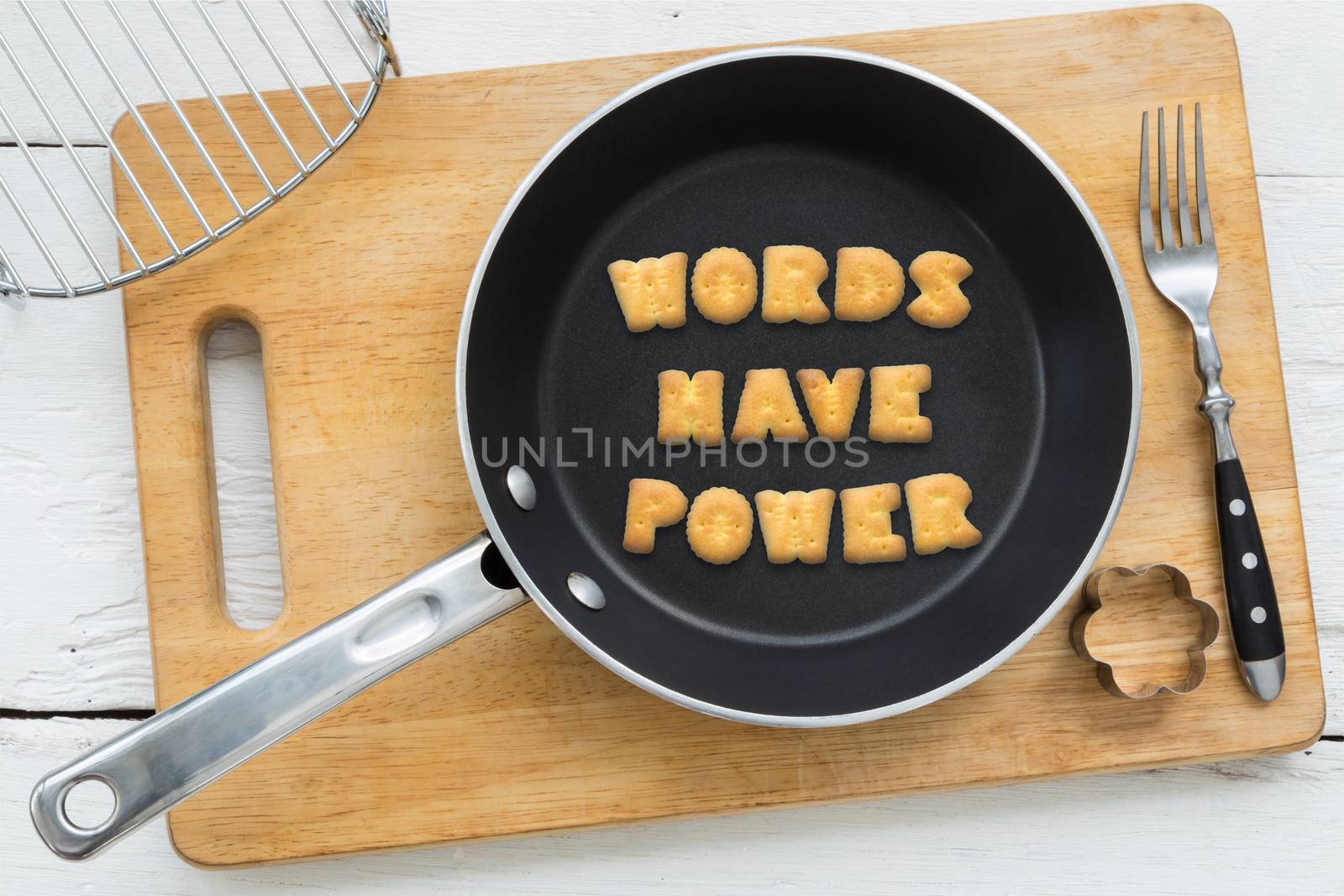 Cookie biscuits quote WORDS HAVE POWER in frying pan by vinnstock