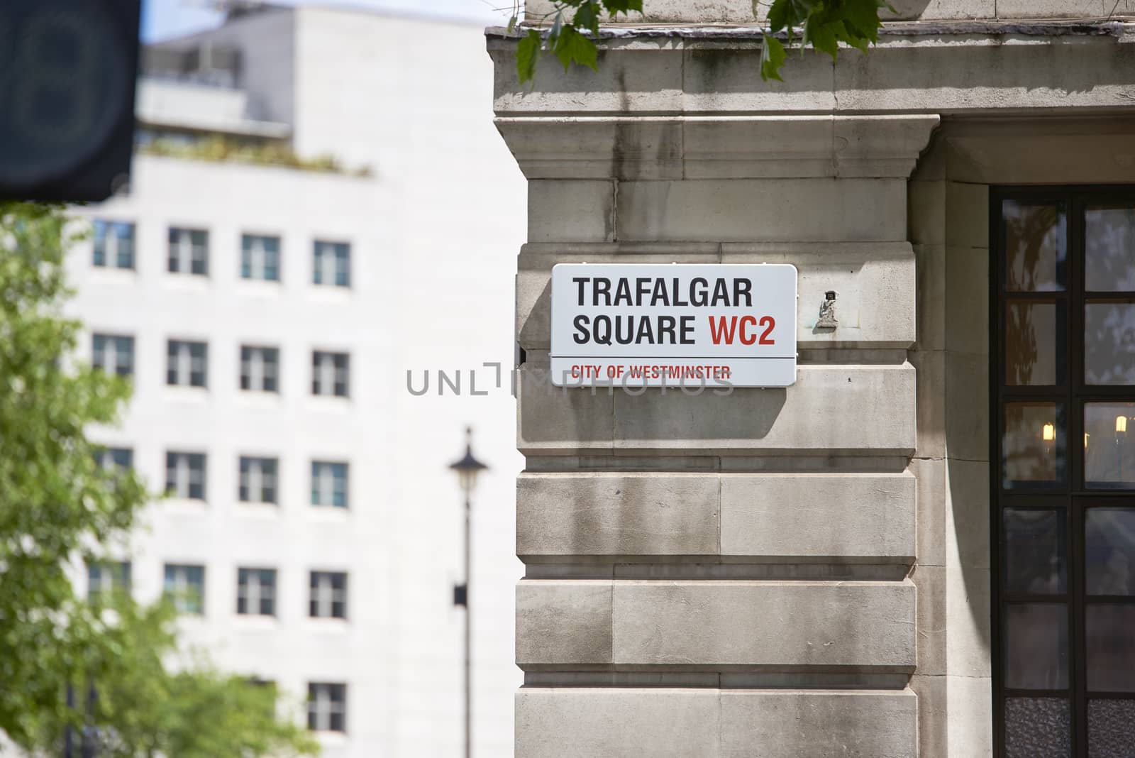 LONDON, UK - JUNE 15: Detail of Trafalgar Square street sign. June 15, 2015 in London. Trafalgar Square is at the heart of the city and is a popular tourist attraction.