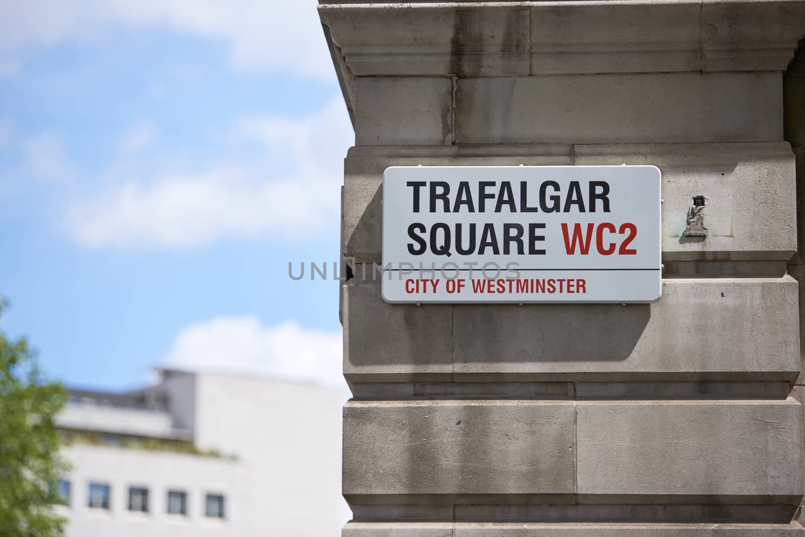 LONDON, UK - JUNE 15: Detail of Trafalgar Square street sign. June 15, 2015 in London. Trafalgar Square is at the heart of the city and is a popular tourist attraction.