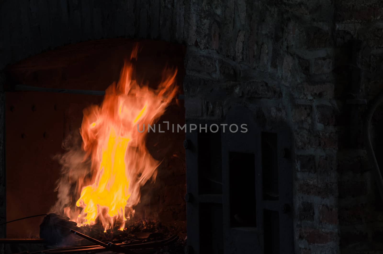 Embers and flame from a forge