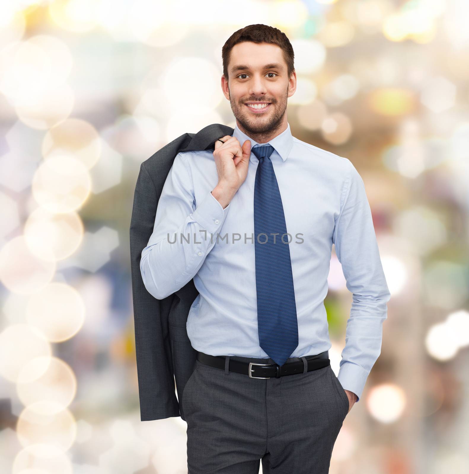 business and people concept - smiling young and handsome businessman