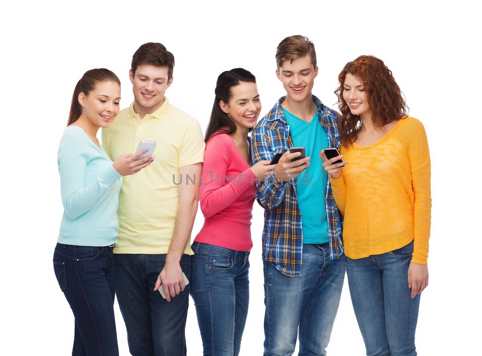 friendship, technology and people concept - group of smiling teenagers with smartphones