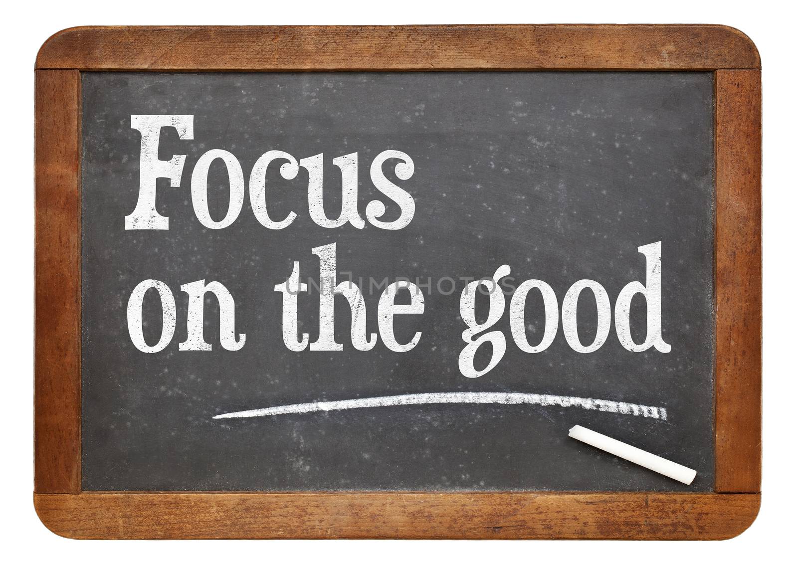 Focus on the good - positivity concept - text on a vintage slate blackboard