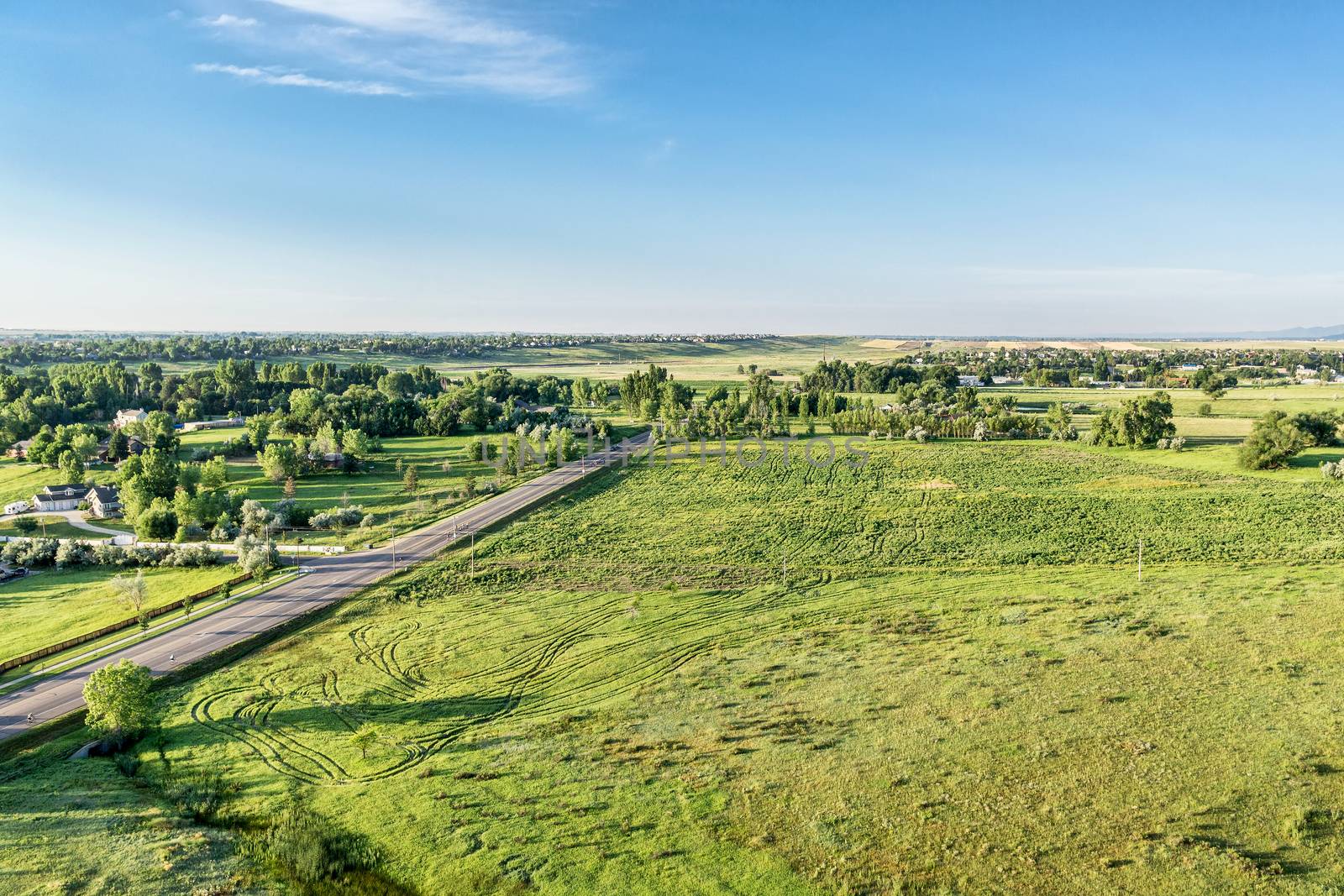 Aerial view of Rocky Mountains foothills  by PixelsAway