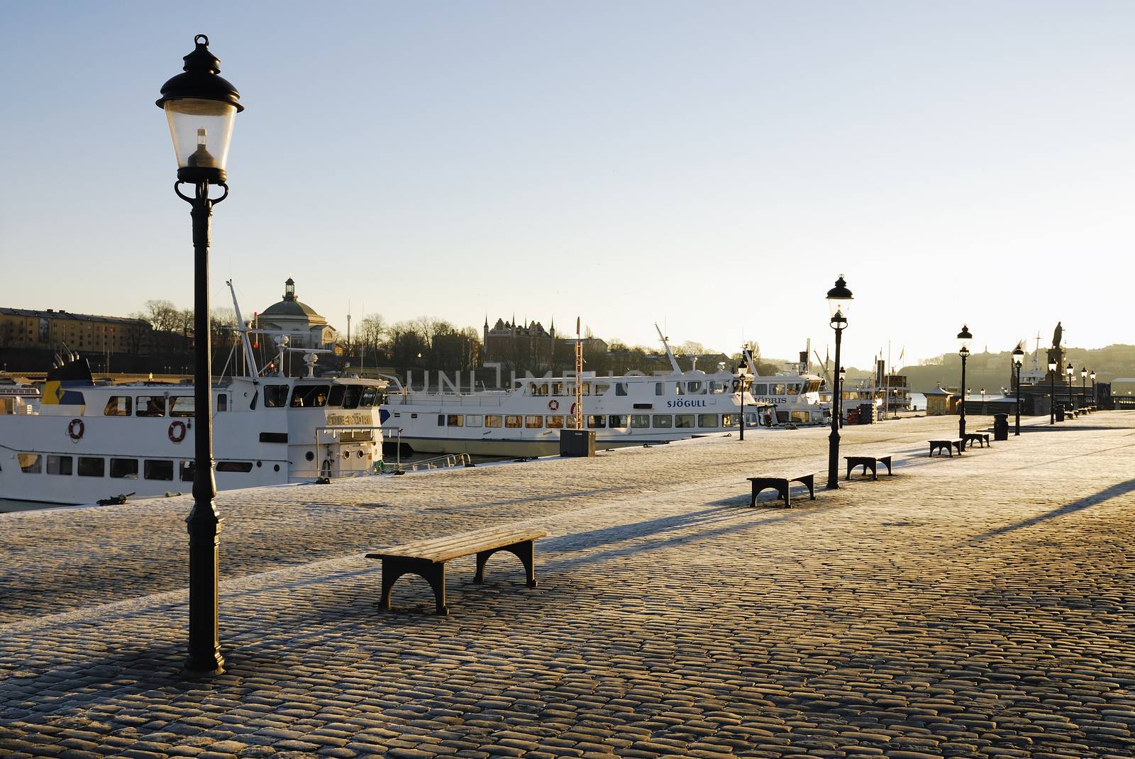 Stockholms embankment with a lamps.