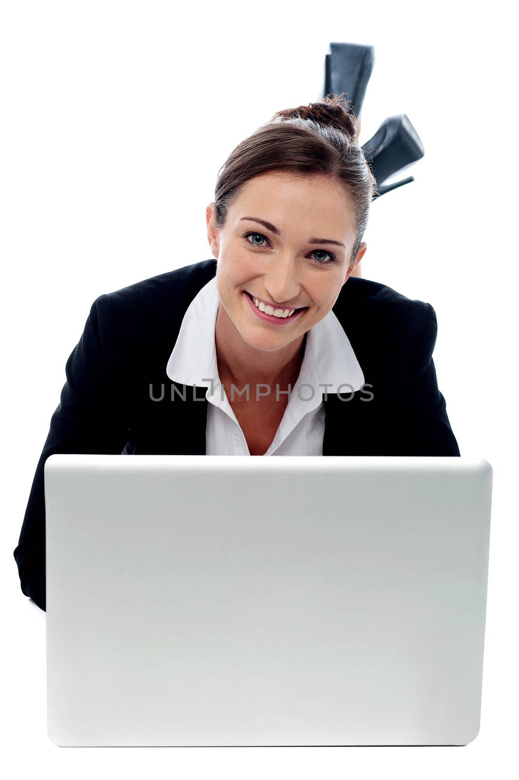 Young business woman laying and working in laptop