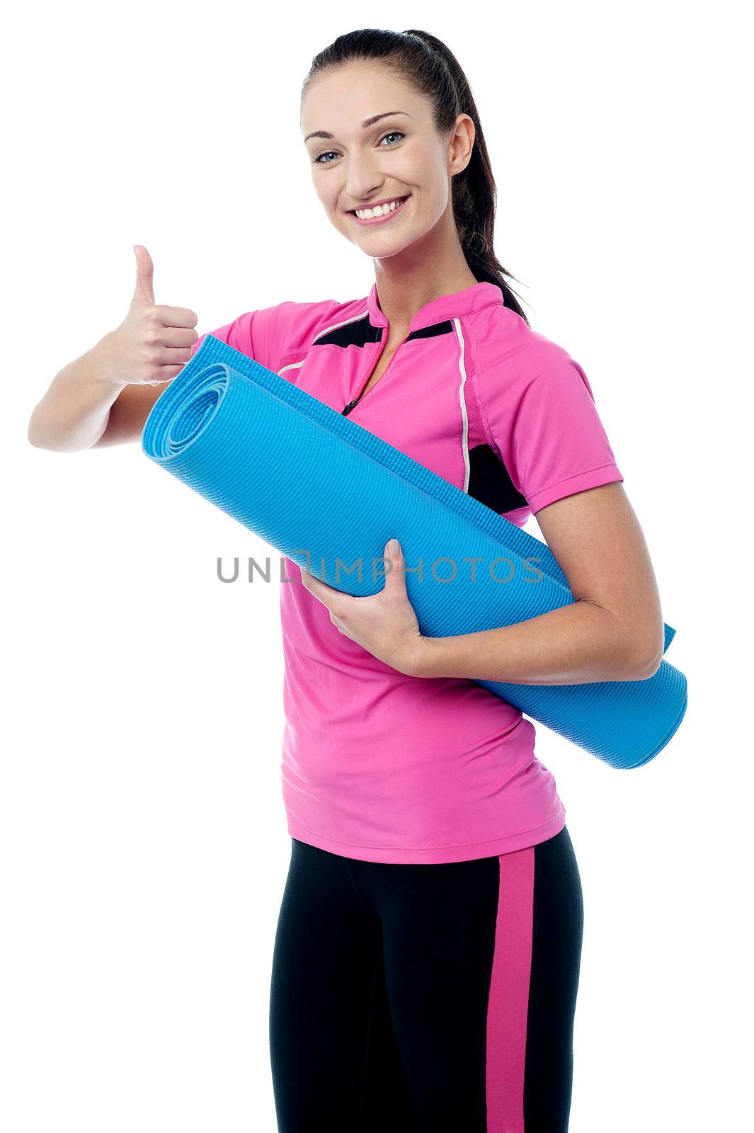 Smiling female trainer gesturing thumbs up