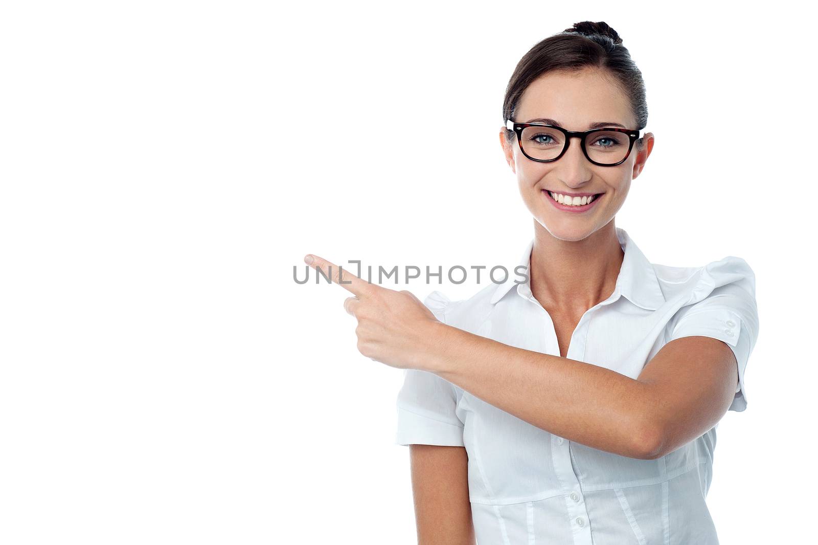 Cheerful woman showing empty copy space