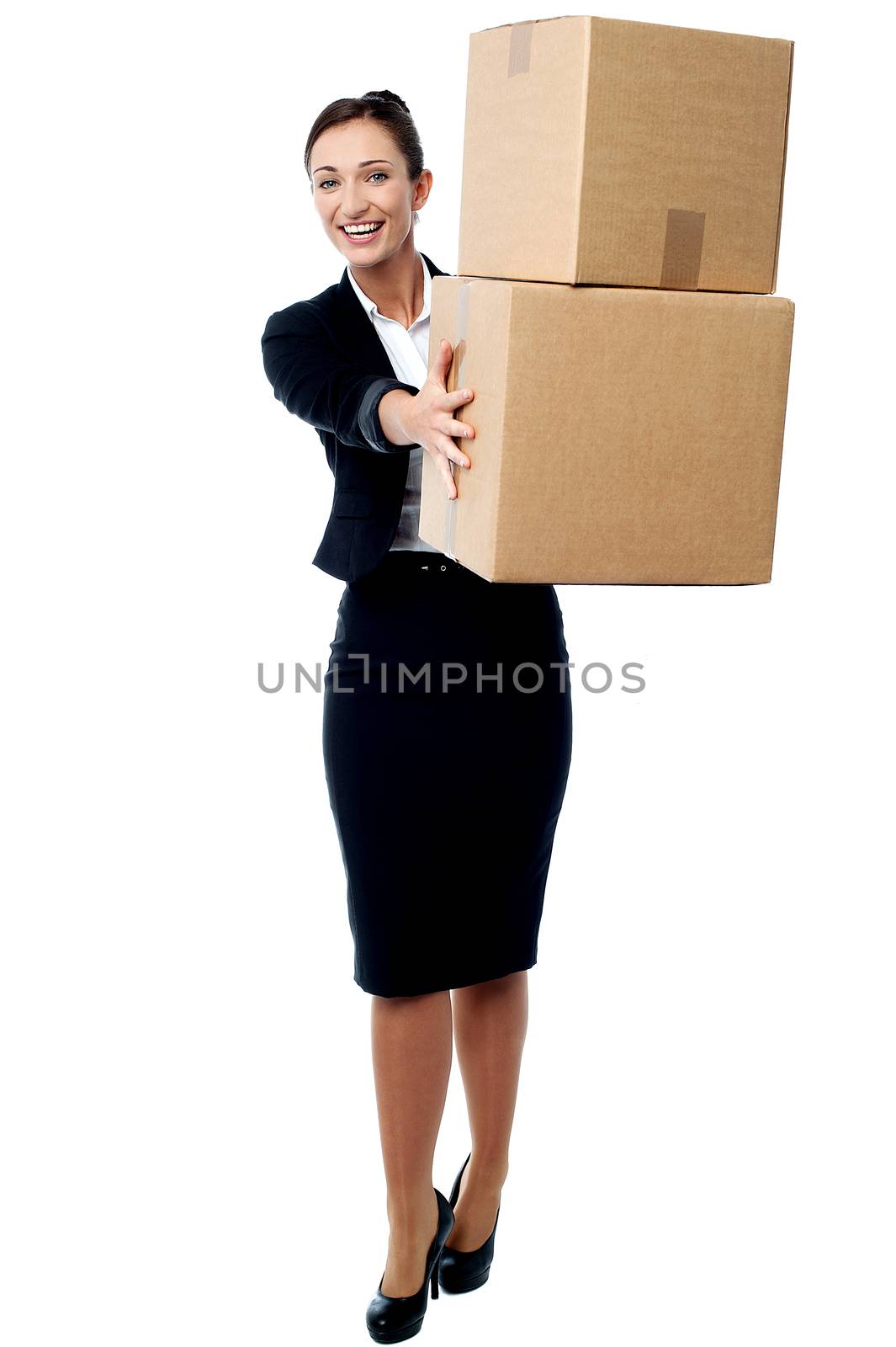 Smiling woman with stack of boxes over white
