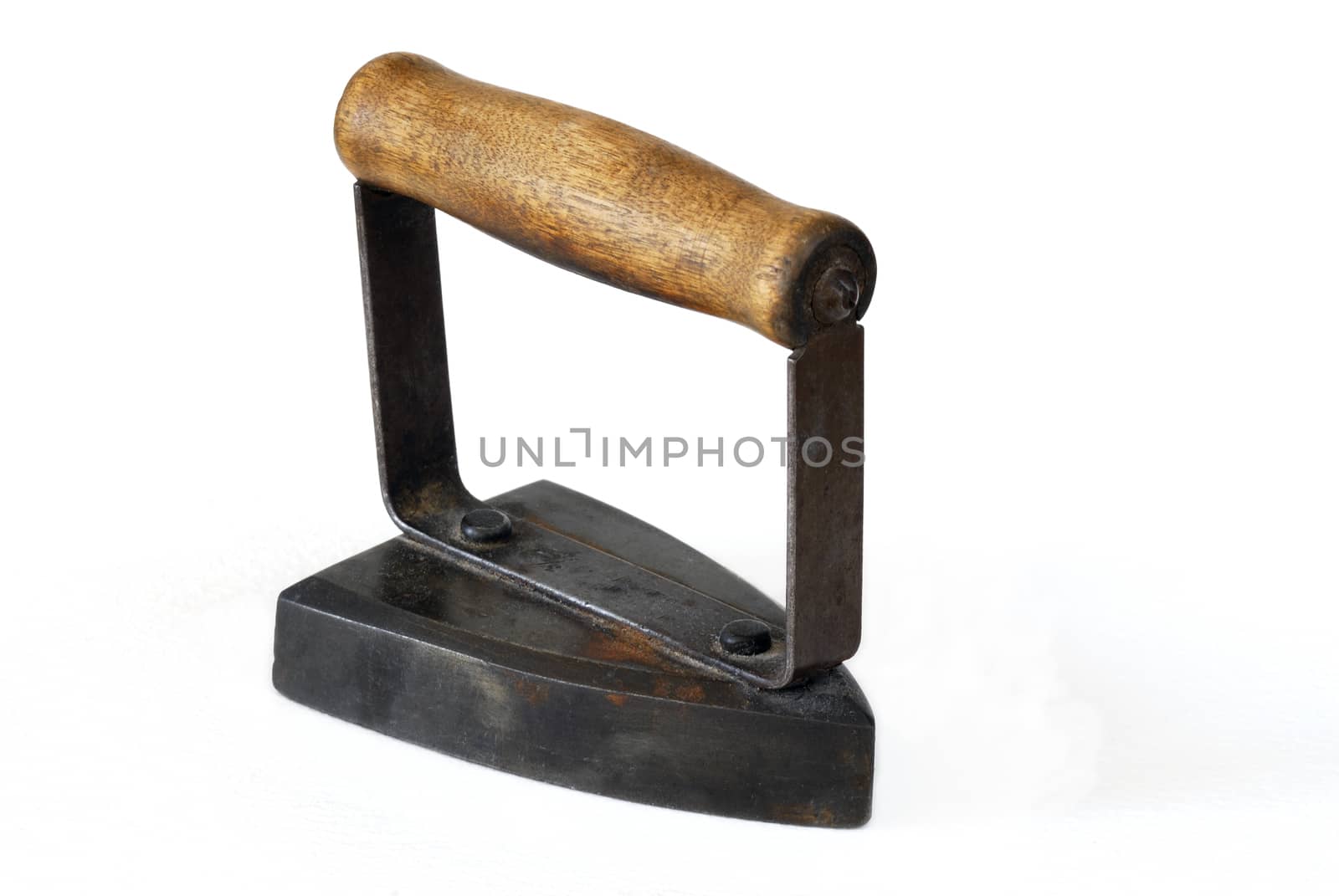 Old iron over white background