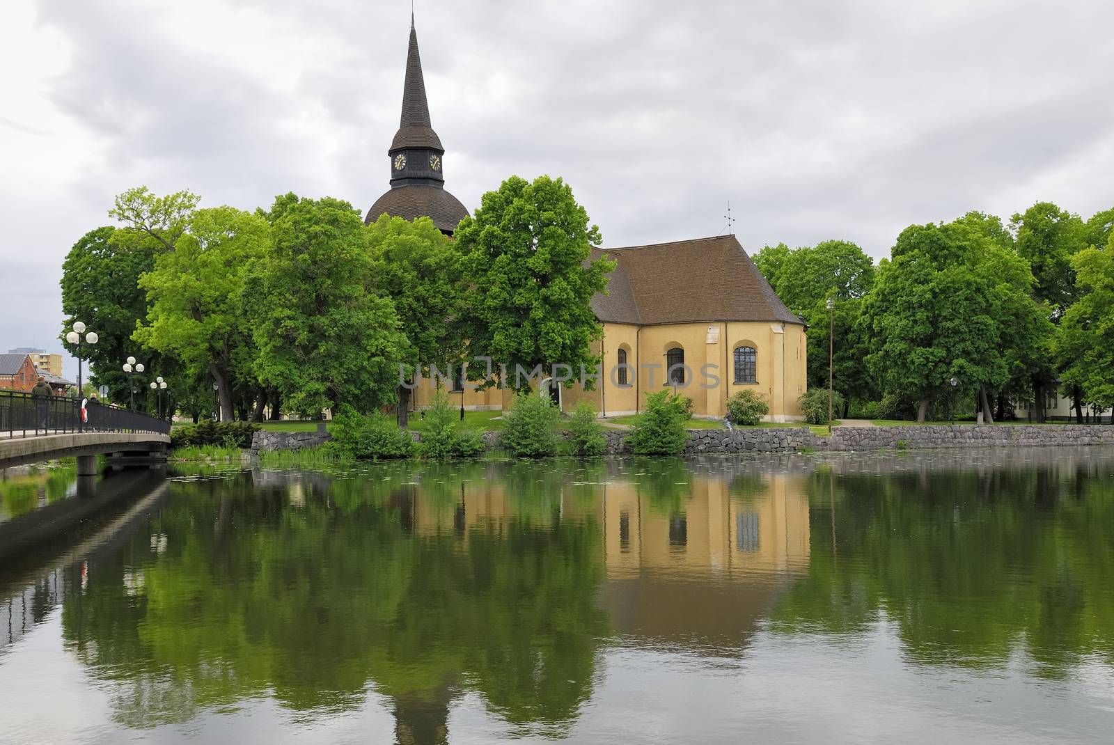 View over Fors church and the water (Eskilstuna river) flowing through the city of Eskilstuna in Södermanland, Sweden.