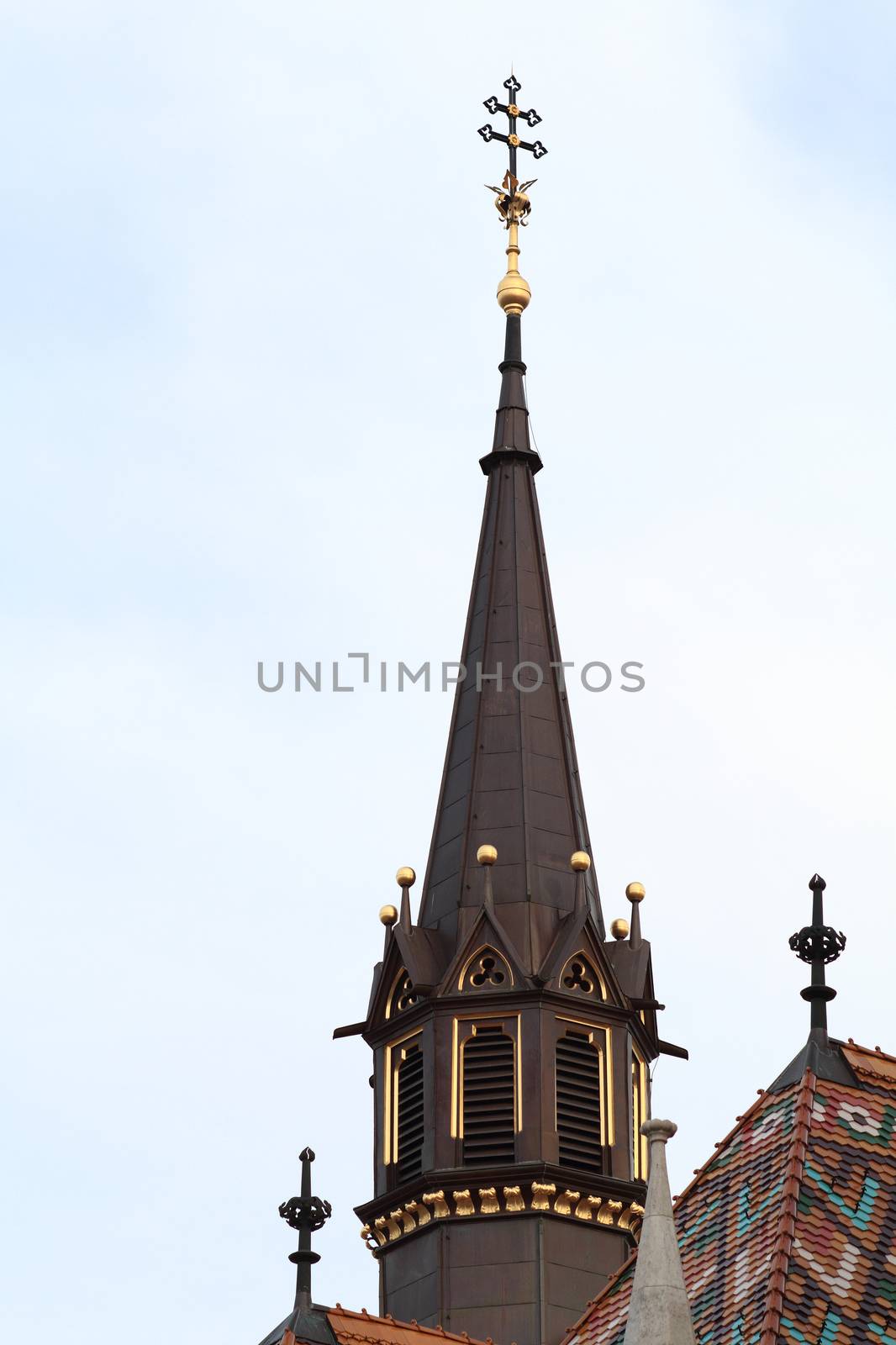 Photo of a high steeple in the city center