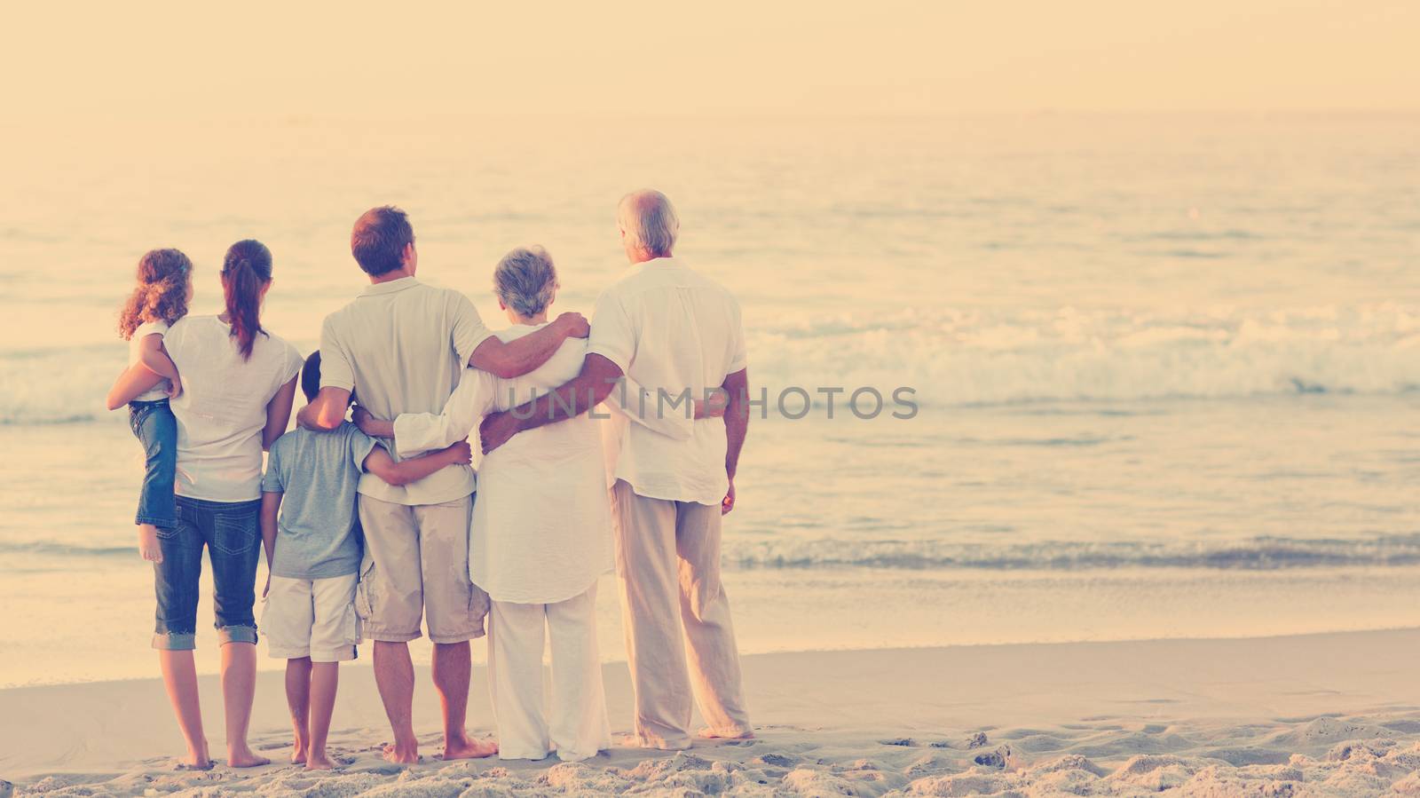 Beautiful family at the beach by Wavebreakmedia