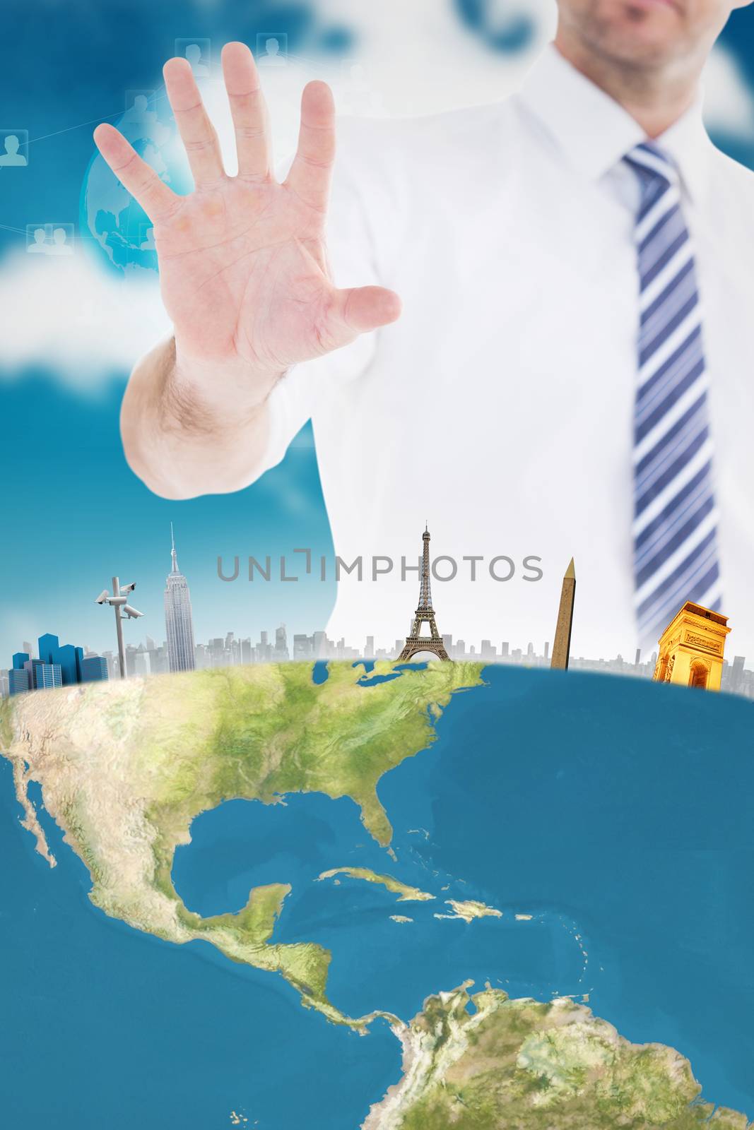 Composite image of handsome businessman gesturing with hand by Wavebreakmedia