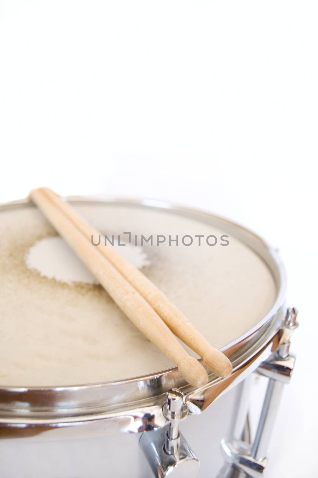 Drums conceptual image. Sticks lies on snare.