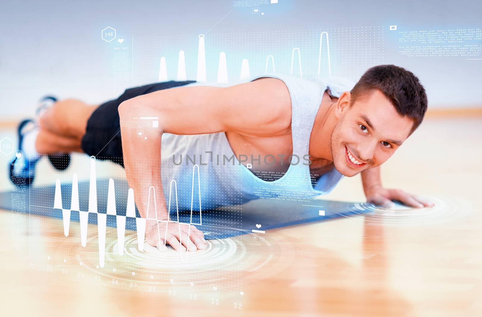 smiling man doing push-ups in the gym by dolgachov