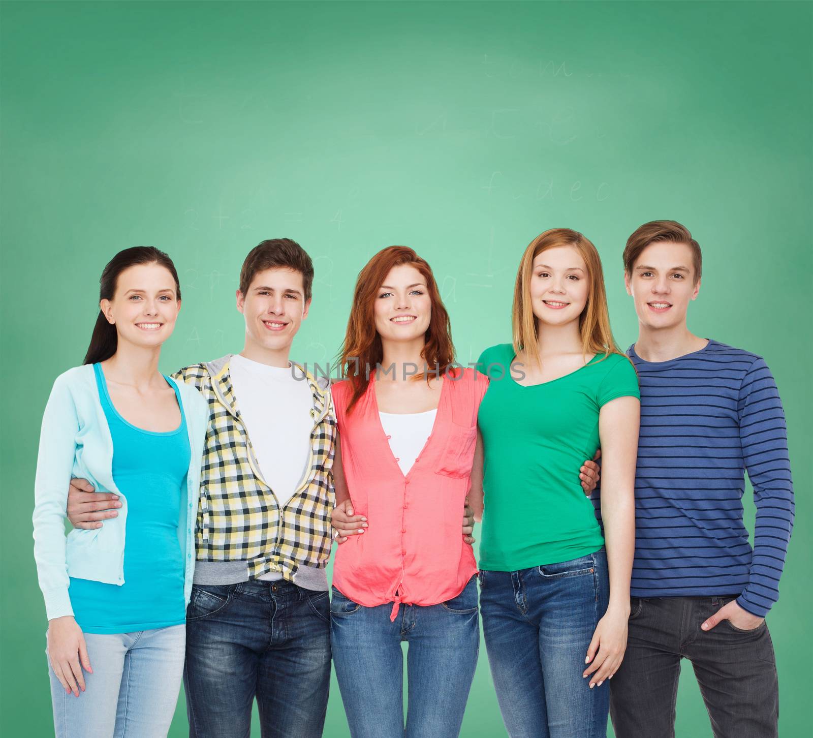 education and people concept - group of smiling students standing