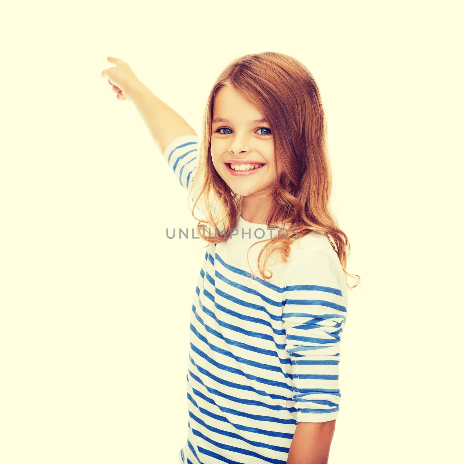 smiling girl pointing at virtual screen by dolgachov