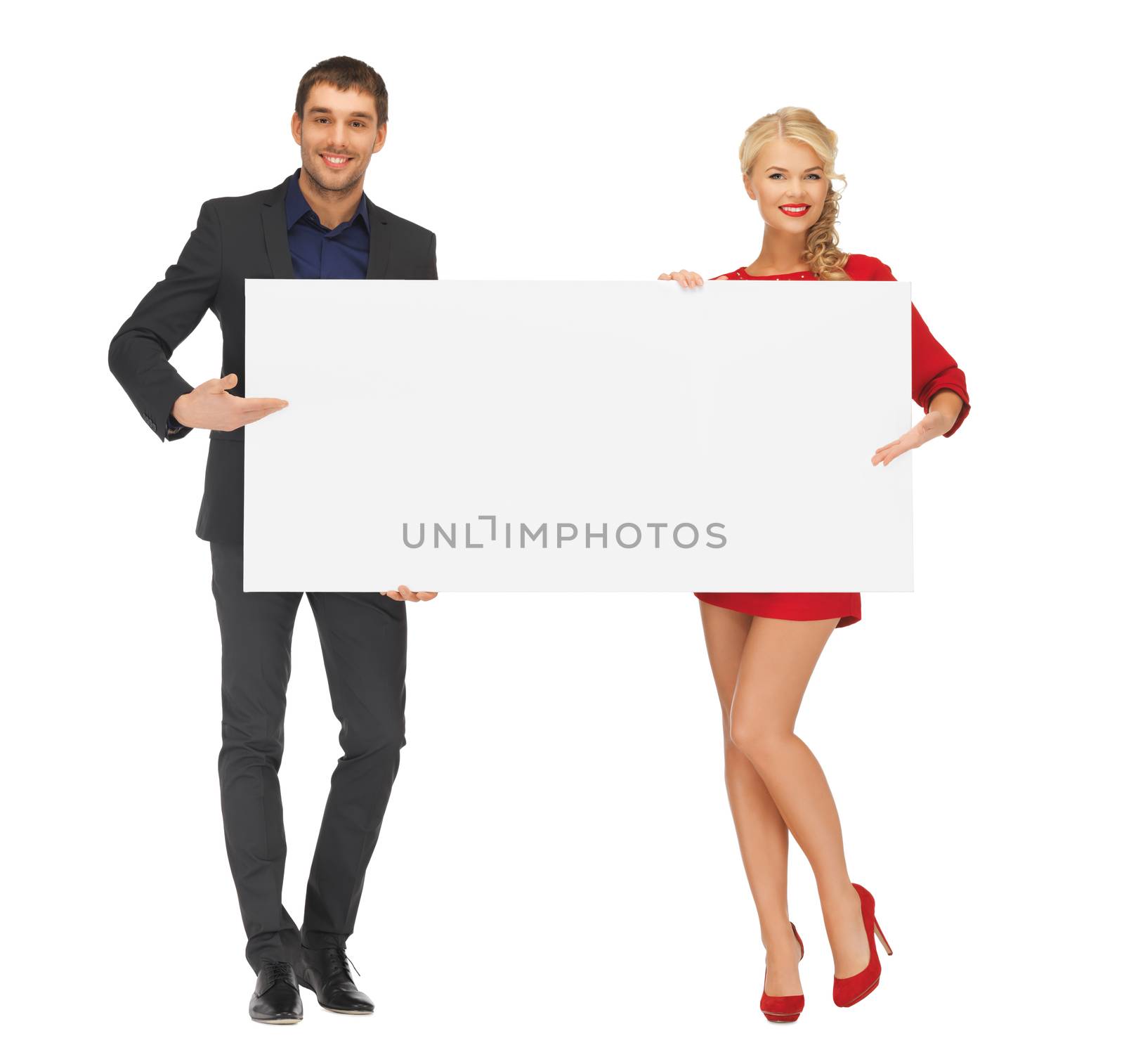 advertising and fashion concept - smiling couple holding big blank white board