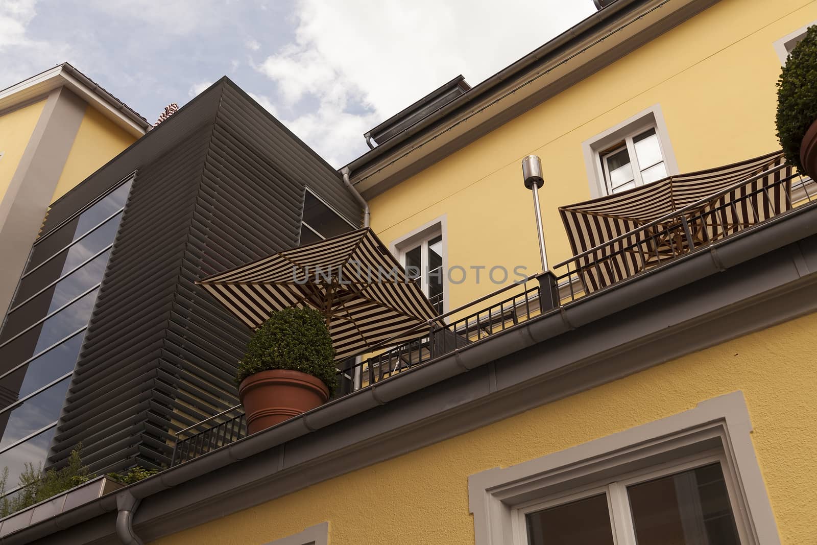 A terrace with parasols and decoration taken from below