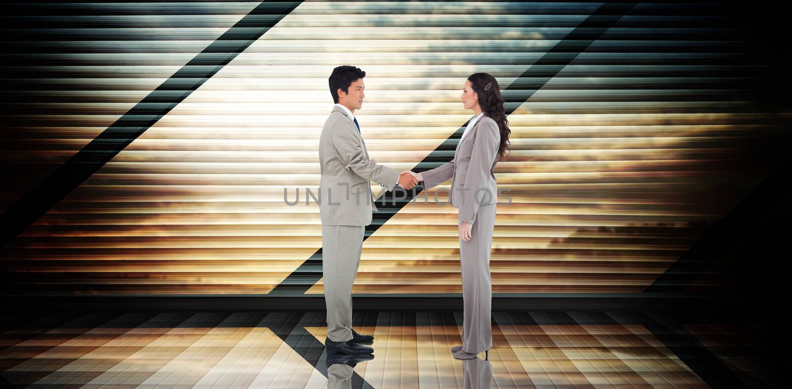 Composite image of business people shaking hands by Wavebreakmedia