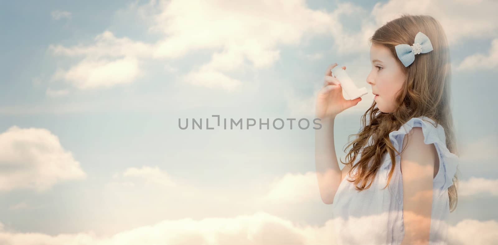 Cloudy sky against little girl taking inhaler 