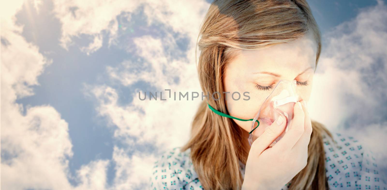 Bright blue sky with clouds against depressed female patient with a mask