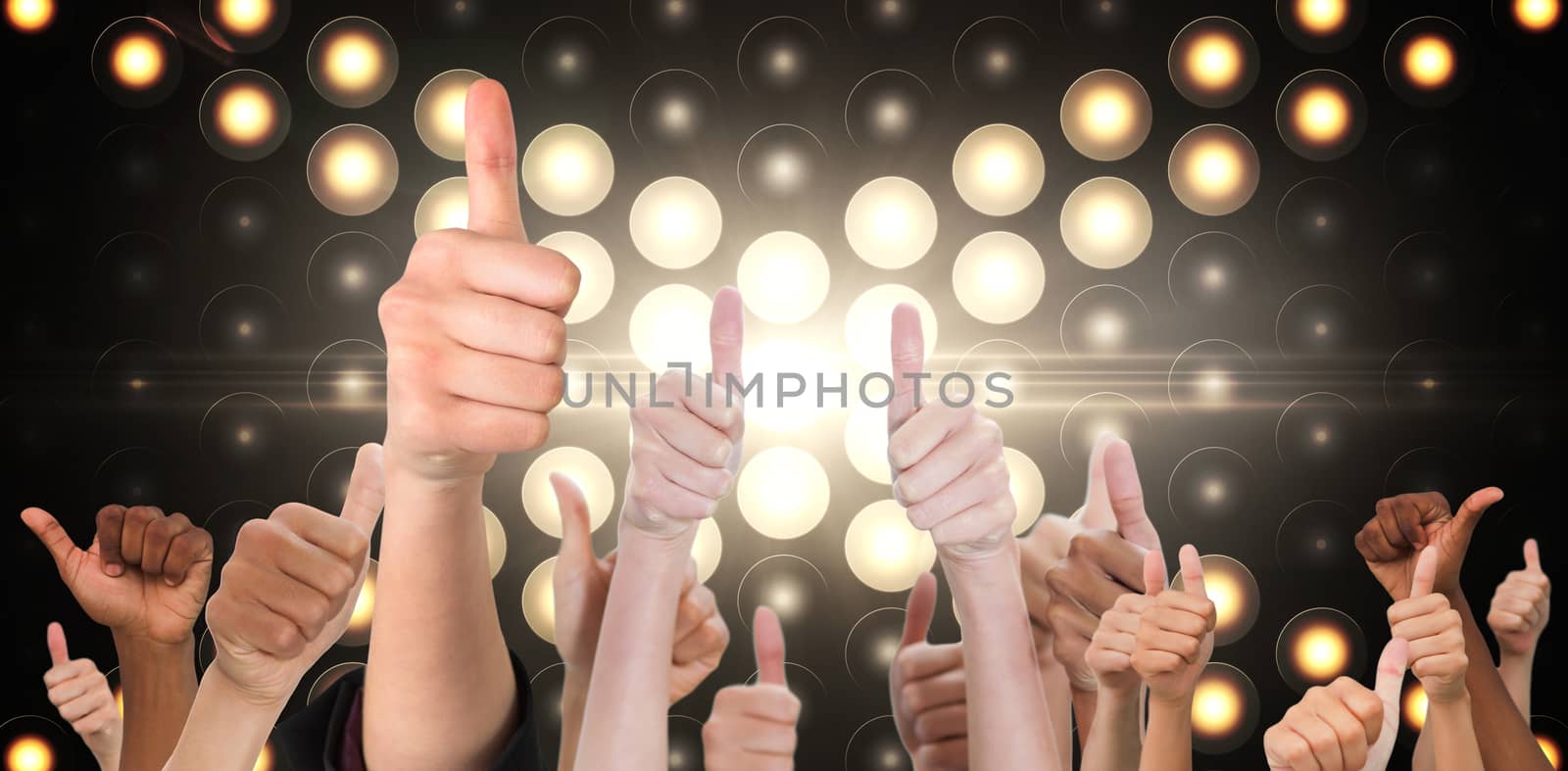 Hands showing thumbs up against digitally generated disco light background