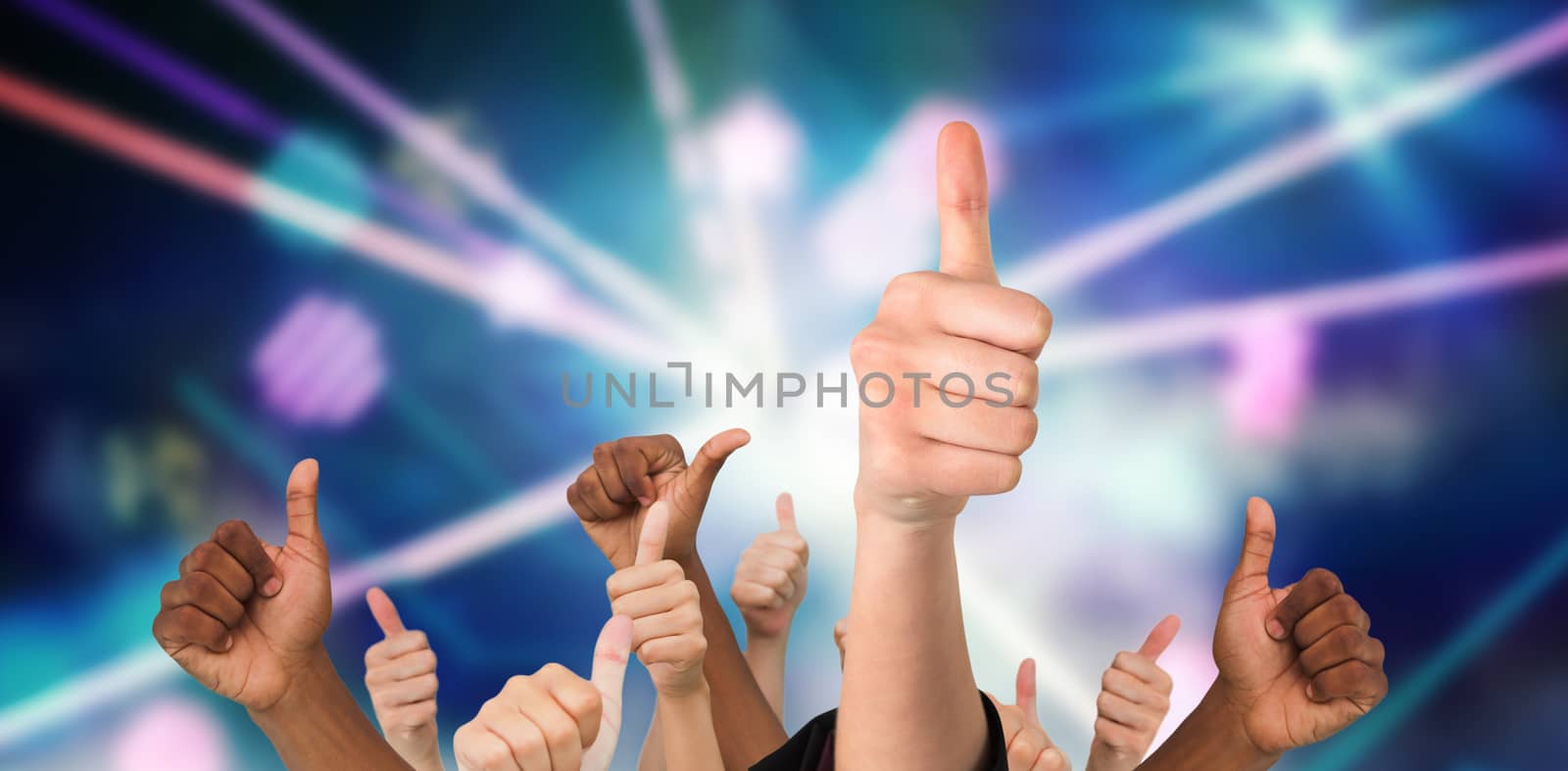 Hands showing thumbs up against digitally generated laser lights background