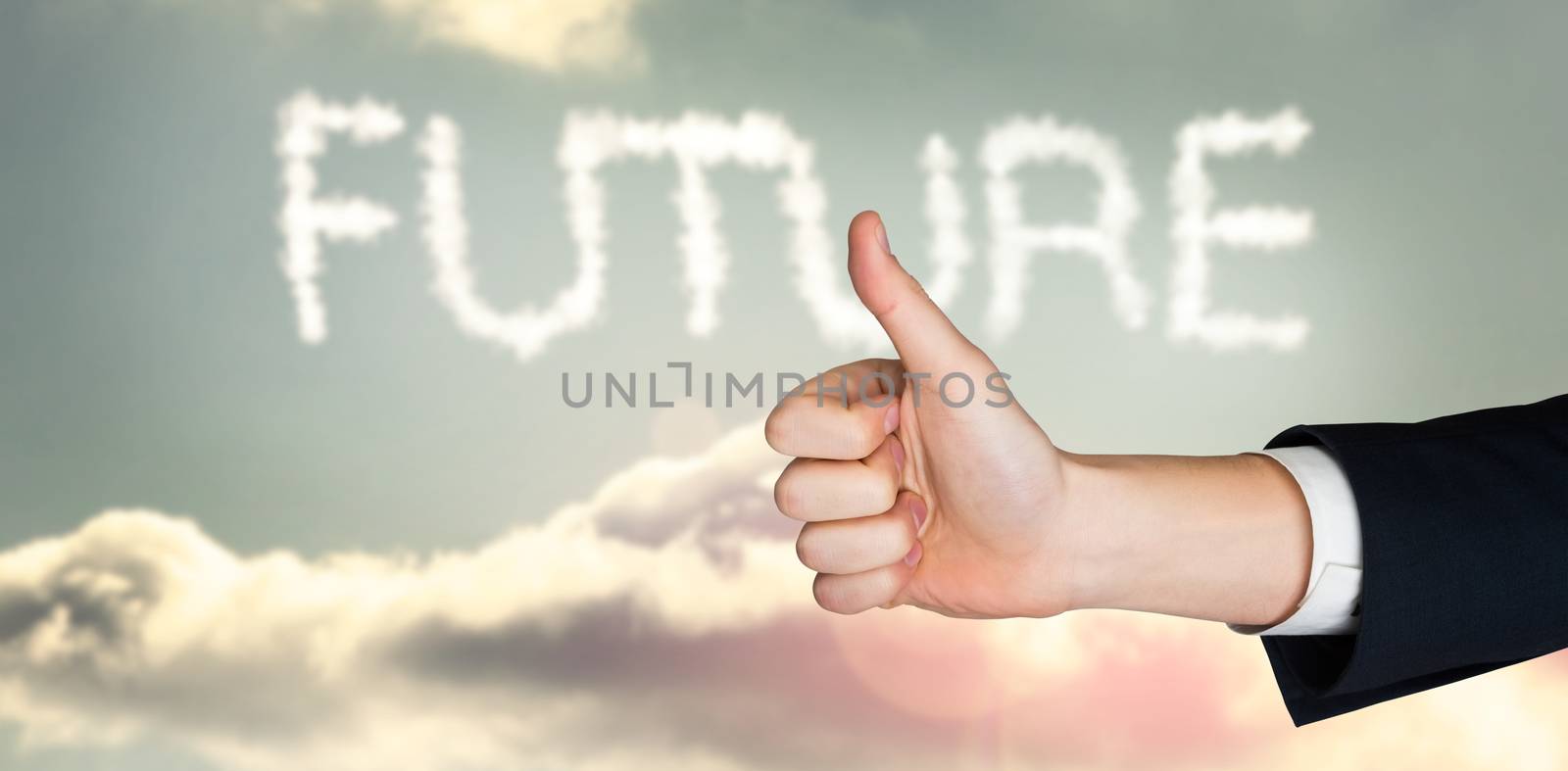 Hand showing thumbs up against clouds spelling out future