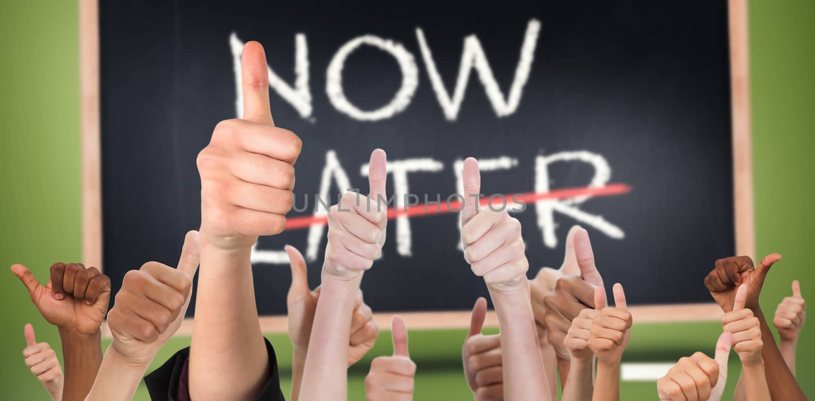 Hands showing thumbs up against now and later written on blackboard