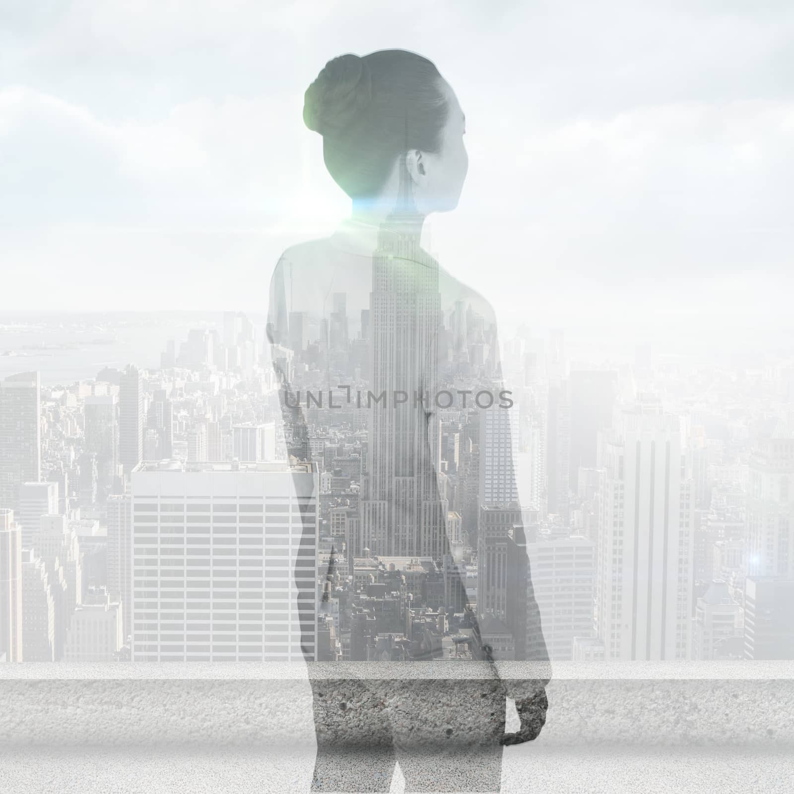 Unsmiling asian businesswoman against cityscape