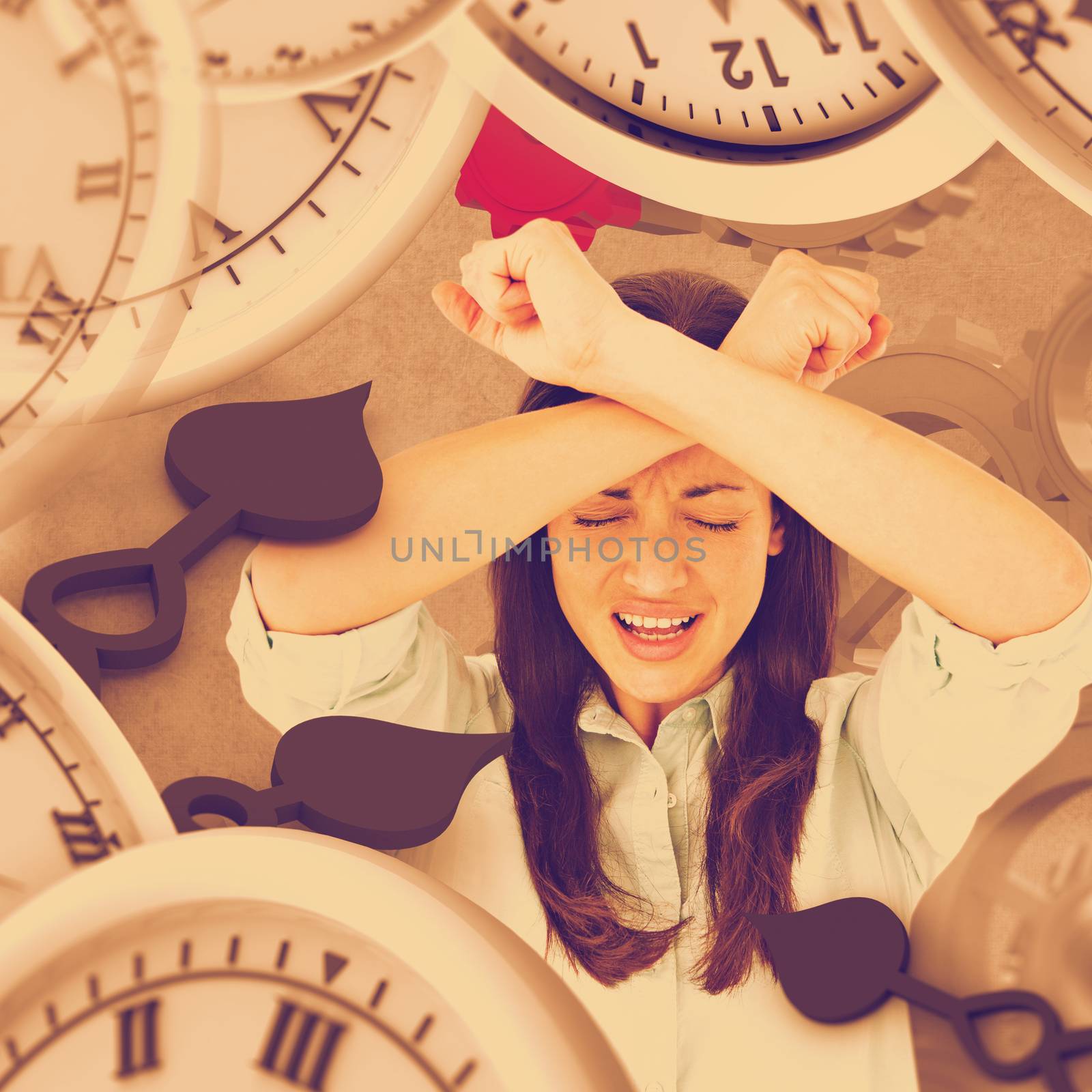 Troubled woman crying against grey background