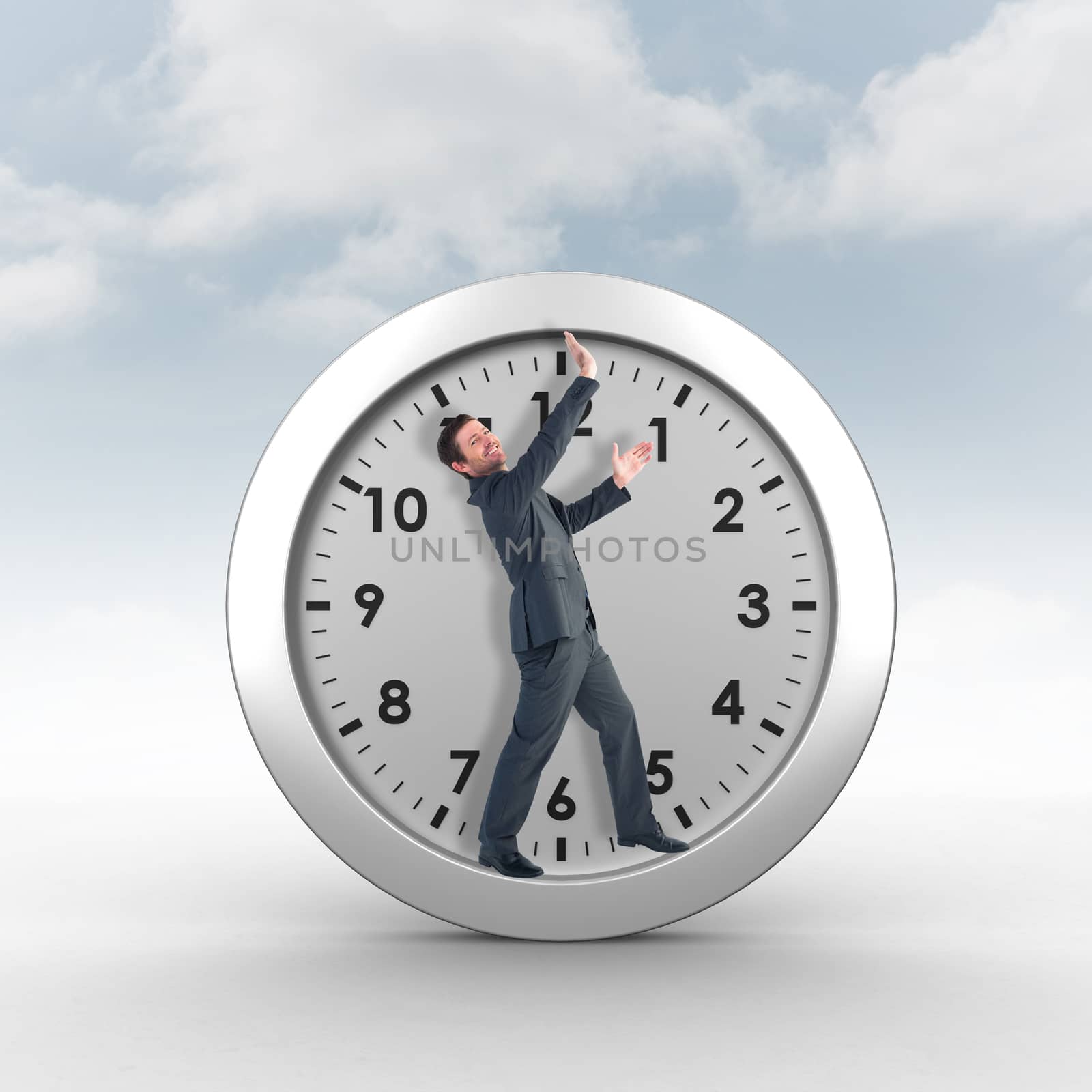 Businessman with his hands up against cloudy sky background