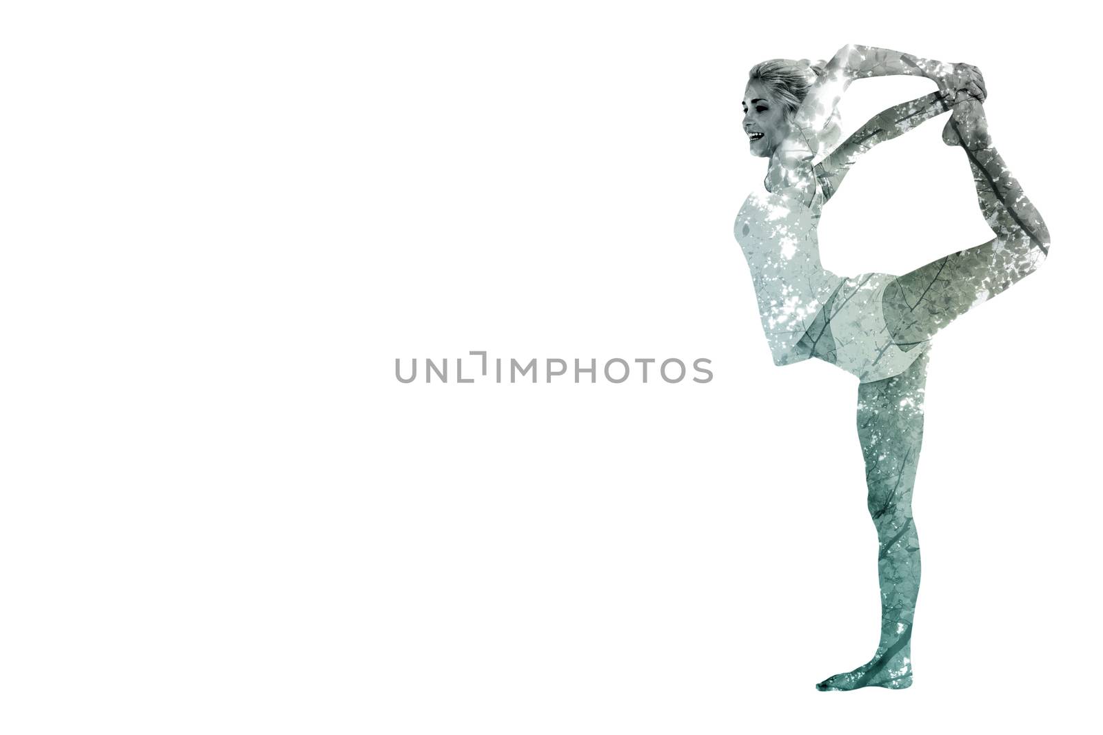 Composite image of sporty woman stretching body while balancing on one leg by Wavebreakmedia