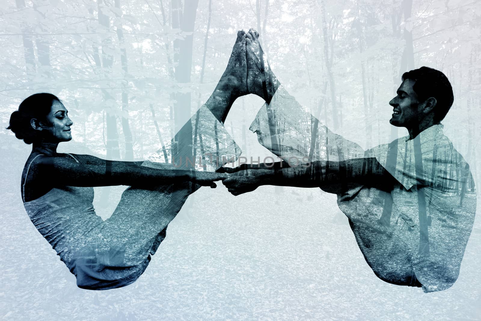 Peaceful couple sitting in boat position together against trees in the autumnal forest