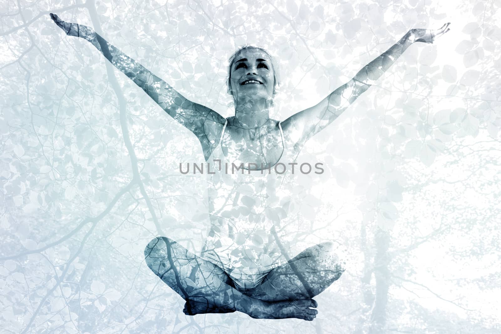 Composite image of toned young woman sitting with arms outstretched by Wavebreakmedia