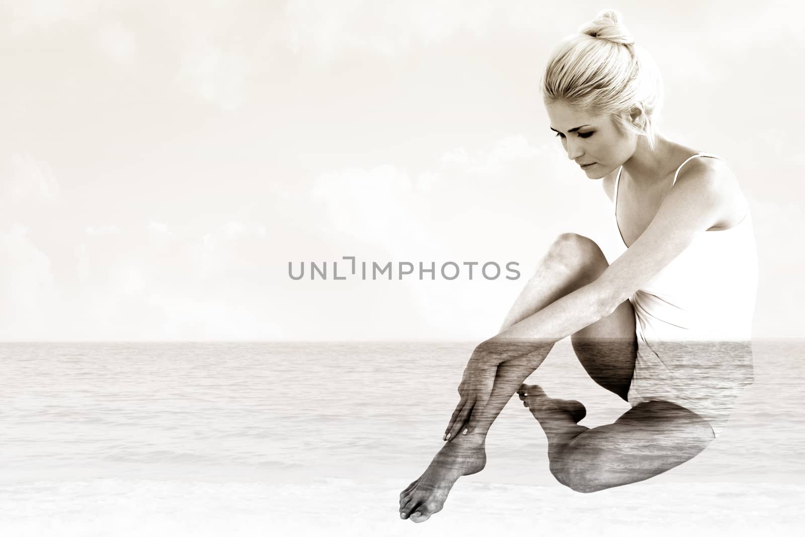 Composite image of full length side view of a toned blond by Wavebreakmedia