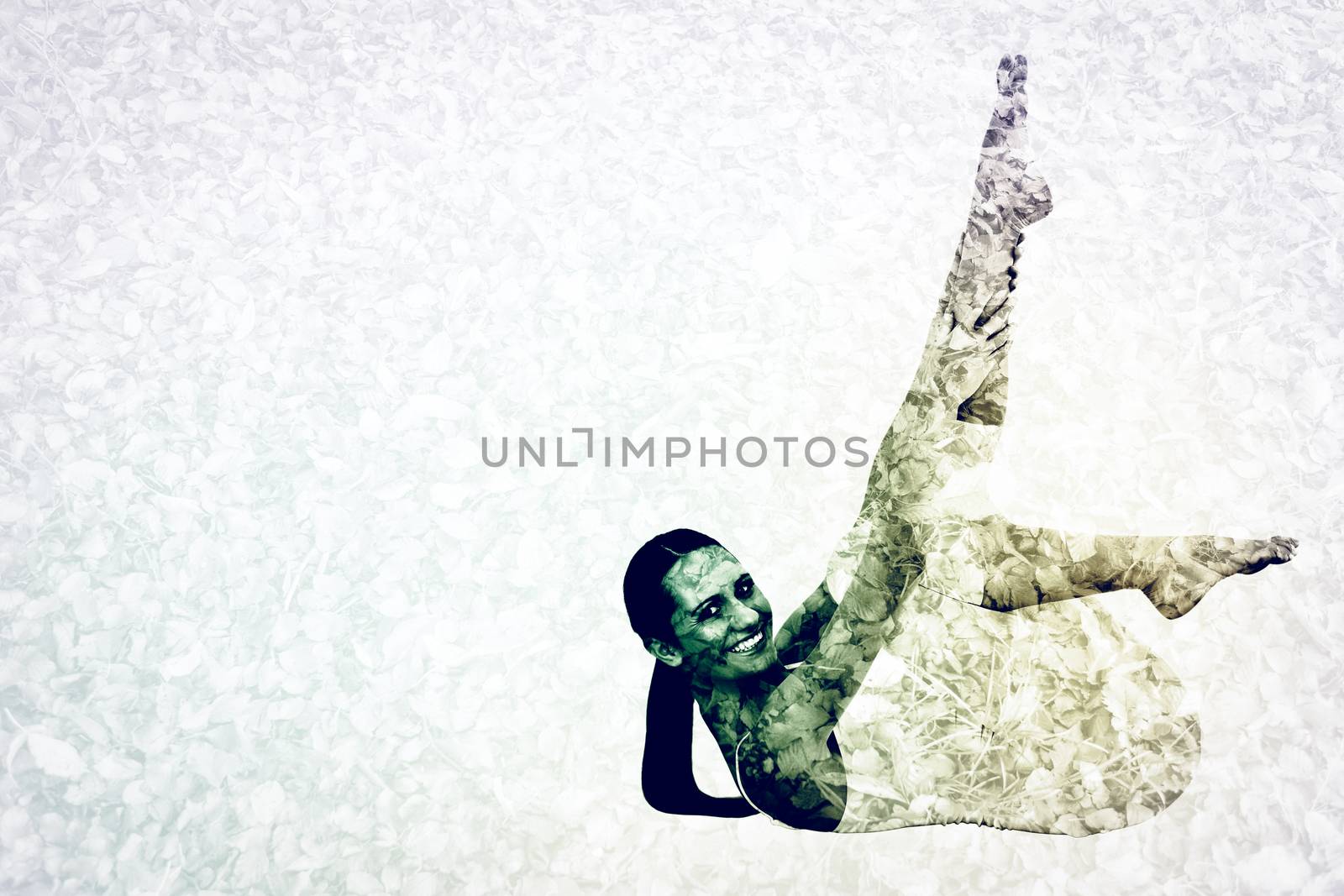 Composite image of fit woman stretching body in fitness studio by Wavebreakmedia